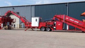 Tong Engineers Narrower Field-Loading Machine